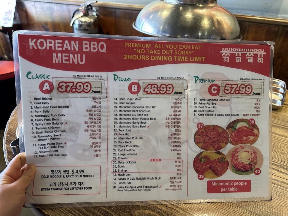 Restaurant menu layout with Korean BBQ selections.